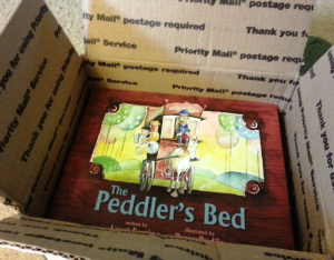 O. M. Gosh, it's my author copies of The Peddler's Bed!
